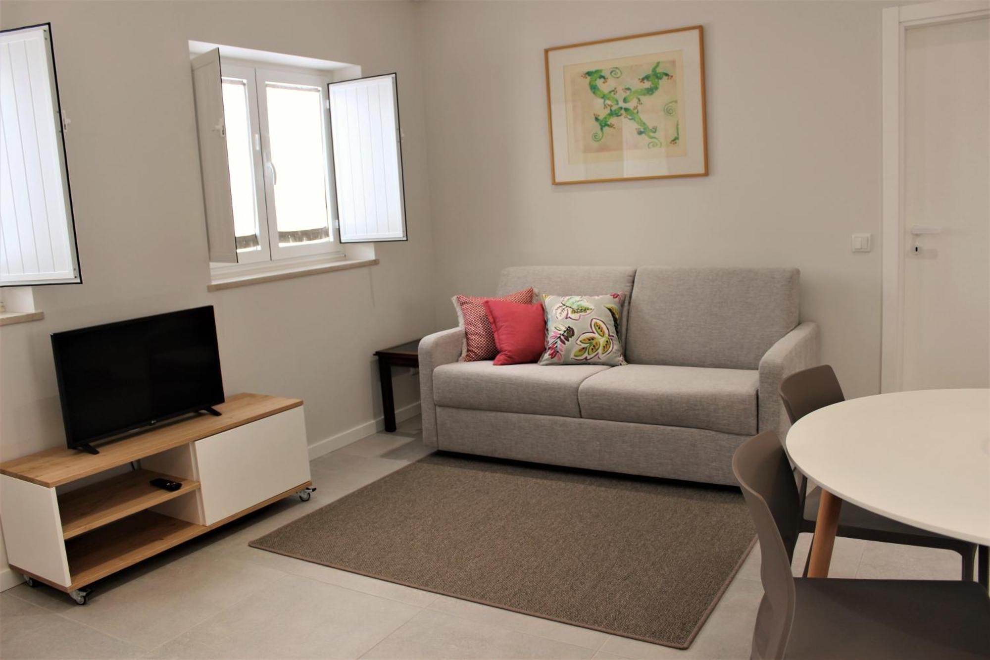 Cardeal Suites & Apartments FAO Rum bild